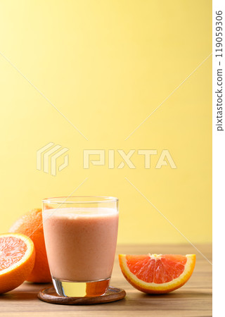 Orange yogurt smoothies in glass, Healthy fruit drink Orange yogurt smoothies in glass, Healthy fruit drink 119059306