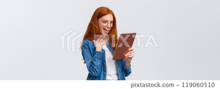 Excited, happy and surprised cheerful redhead woman messaging with friend using gadget, holding digital tablet, touch chest pleased and amazed, laughing out loud looking device screen Excited, happy and surprised cheerful redhead woman messaging with friend using gadget, holding digital tablet, touch chest pleased and amazed, laughing out loud looking device screen 119060510
