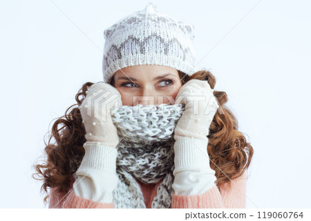 female on wrapping up in scarf and looking on copy space 119060764