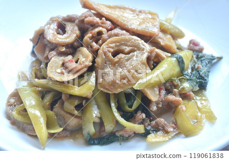 spicy stir fried gluten protein and tofu with basil dressing slice gree chili vegetarian fusion food on plate 119061838