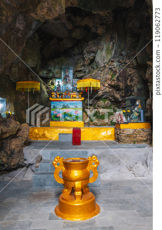 Buddhist temple inside Lynch Nham Cave in Marble Mountains in Da Nang in Asia Buddhist temple inside Lynch Nham Cave in Marble Mountains in Da Nang in Asia 119062773
