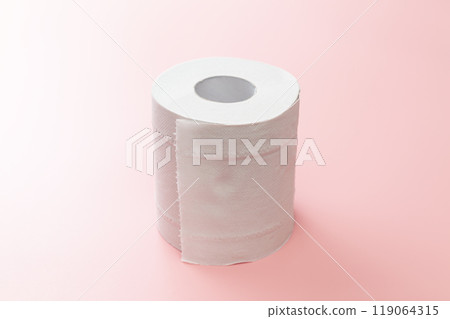 Toilet paper on a pink background Toilet paper on a pink background 119064315