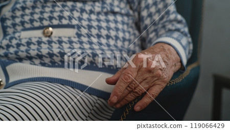 Close up of elderly patient's hand during therapy session Close up of elderly patient's hand during therapy session 119066429