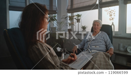 Workplace of psychologist: Female specialist listens to patient's story 119066599