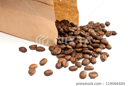 coffee poured from a brown package 119066884