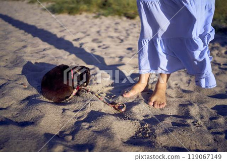 young plus size woman walking and playing with her pet rabbit by the sea in Copenhagen young plus size woman walking and playing with her pet rabbit by the sea in Copenhagen 119067149