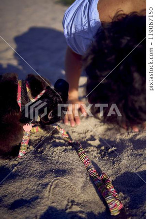 young plus size woman walking and playing with her pet rabbit by the sea in Copenhagen young plus size woman walking and playing with her pet rabbit by the sea in Copenhagen 119067150