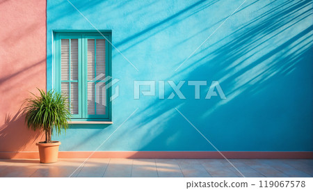Dayllght facade with shadow on blue color wall. Beautiful stylish bright building 119067578