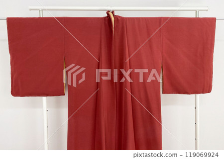 Colorful kimono robe on a hanger, promo photo for an online women's clothing store 119069924
