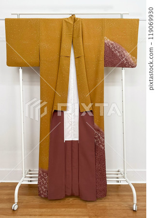 Colorful kimono robe on a hanger, promo photo for an online women's clothing store 119069930