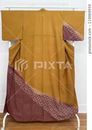 Colorful kimono robe on a hanger, promo photo for an online women's clothing store 119069934