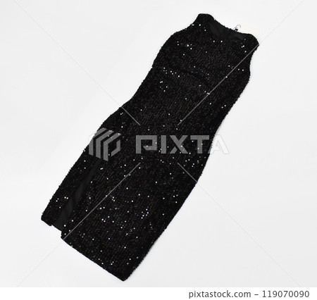 Black sequins dress on white background, fancy evening clothes 119070090