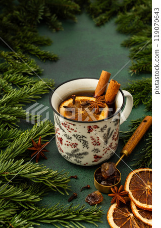 Tea in a mug on winter background Tea in a mug on winter background 119070643