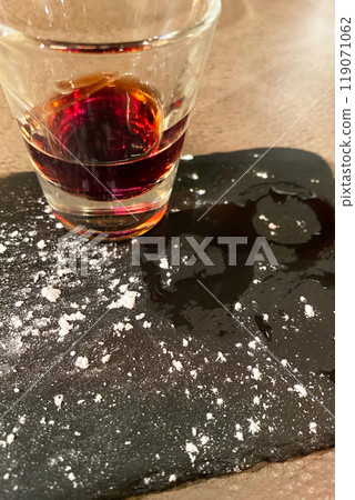A small glass of port wine 119071062