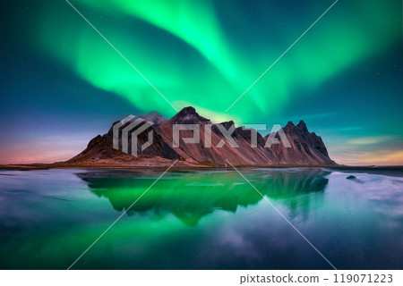 Famous Stokksnes mountains on Vestrahorn cape in Iceland Famous Stokksnes mountains on Vestrahorn cape in Iceland 119071223