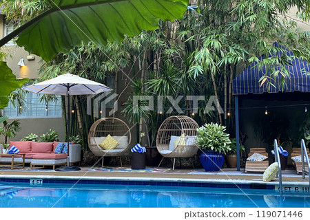 Garden furniture near the pool, patio interior 119071446