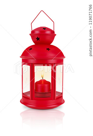 Red decorative lantern with a lit candle inside, isolated on a white background. Stock photo. Red decorative lantern with a lit candle inside, isolated on a white background. Stock photo. 119071766