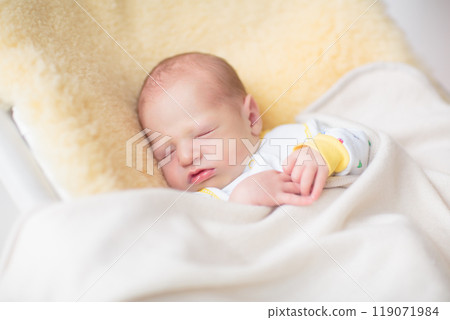Little baby on white bed Little baby on white bed 119071984