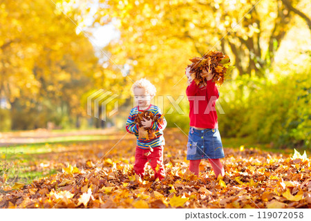 Kids playing in autumn park 119072058