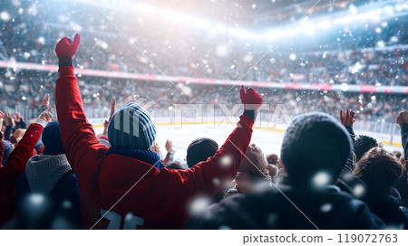 Excited Hockey Fans Celebrate in Packed Stadium During Winter Match 119072763