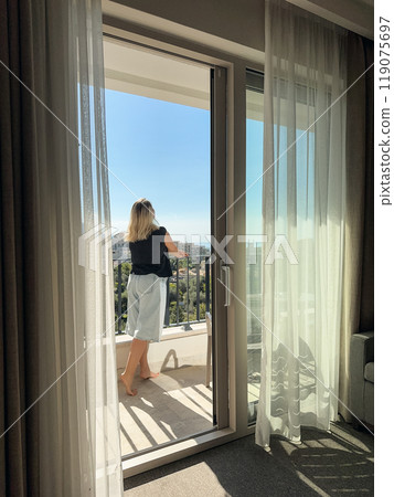 A woman  on the balcony 119075697