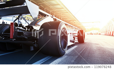 sleek racing car positioned on track, showcasing its powerful rear tires and aerodynamic design, ready for thrilling race. sun sets in background, enhancing excitement sleek racing car positioned on track, showcasing its powerful rear tires and aerodynamic design, ready for thrilling race. sun sets in background, enhancing excitement 119078248