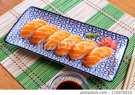 Sake Nigiri served in a plate with soya sauce 119078819