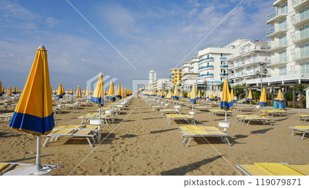 Umbrellas on the beach of Lido di Jesolo near Venice, Veneto region, Italy. Umbrellas on the beach of Lido di Jesolo near Venice, Veneto region, Italy. 119079871