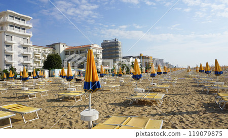 Umbrellas on the beach of Lido di Jesolo near Venice, Veneto region, Italy. Umbrellas on the beach of Lido di Jesolo near Venice, Veneto region, Italy. 119079875