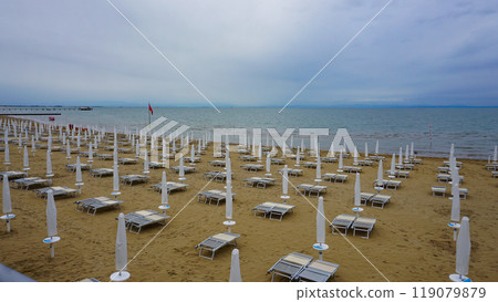 Adriatic sea with shore. Lignano Sabbiadoro, Italy. Adriatic sea with shore. Lignano Sabbiadoro, Italy. 119079879