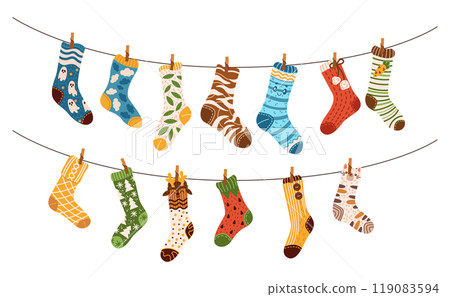 Colorful socks with patterns hanging on clotheslines image 119083594