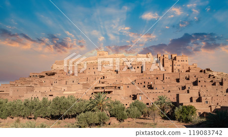 Ait Ben Haddou, Morocco's ancient mud-brick village, features narrow streets and fortifications, once a major stop on the Sahara caravan route. Ait Ben Haddou, Morocco's ancient mud-brick village, features narrow streets and fortifications, once a major stop on the Sahara caravan route. 119083742