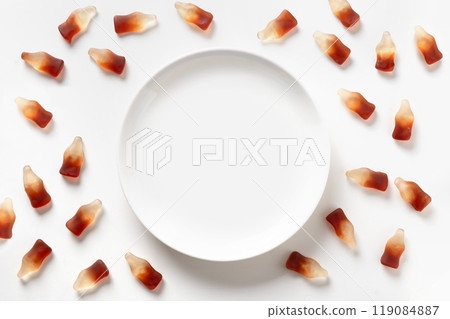 Gummy jellies in shape of soda bottles on white background. Gummy jellies in shape of soda bottles on white background. 119084887