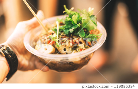 Thai style of grilled squid barbeque in seafood spicy sauce 119086354