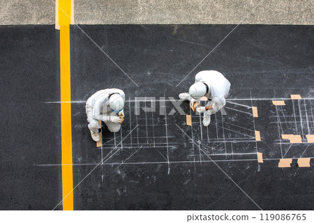 Parking lot lettering paving work 119086765