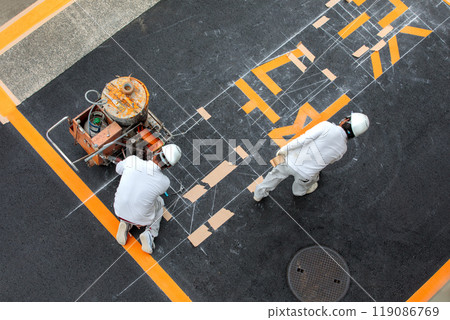 Parking lot lettering paving work 119086769