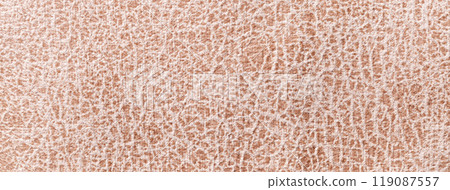 Light beige background fabric with wavy pattern, closeup. Velvet texture of seamless brown textile, macro. Light beige background fabric with wavy pattern, closeup. Velvet texture of seamless brown textile, macro. 119087557