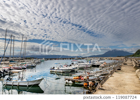 Scenery of Hayato Port in Kirishima City, Kagoshima Prefecture, with moored ships and Sakurajima 119087724