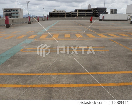 Rooftop parking lot, store, cloudy Rooftop parking lot, store, cloudy 119089465