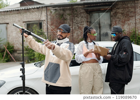 Setting Up Photography Equipment for Outdoor Shoot Setting Up Photography Equipment for Outdoor Shoot 119089670