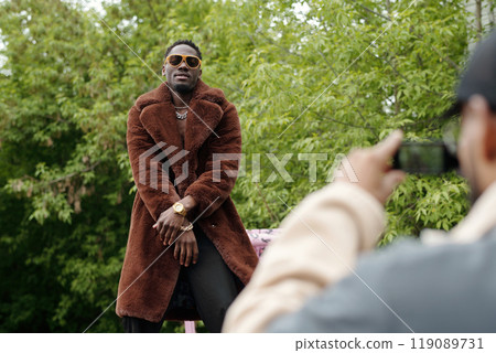 Wearing Stylish Brown Fur Coat Posing Outdoors Wearing Stylish Brown Fur Coat Posing Outdoors 119089731