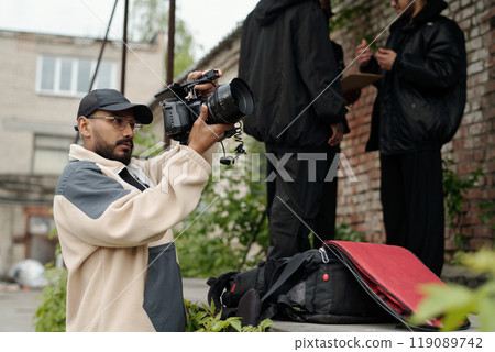 Capturing Footage with Professional Camera Outdoors Capturing Footage with Professional Camera Outdoors 119089742