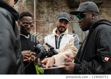 Collaborating on Creative Project with Film Equipment Collaborating on Creative Project with Film Equipment 119089751