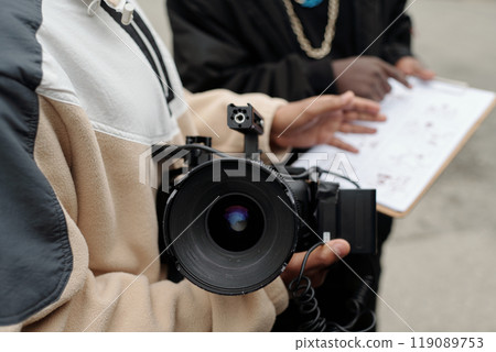 Operating Professional Video Camera for Filming Project Operating Professional Video Camera for Filming Project 119089753