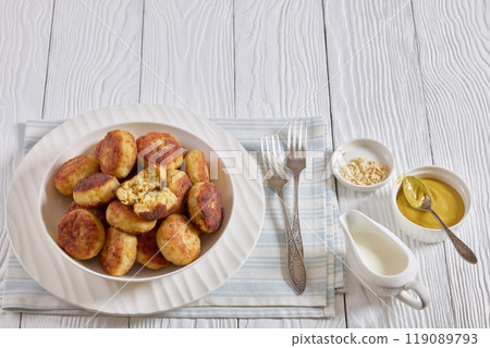 Northern Pike fish cakes in a white bowl 119089793