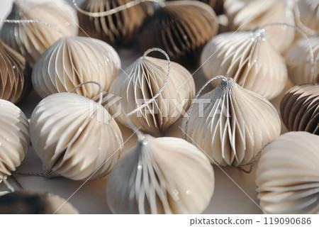 Sustainable, environmentally friendly, plastic free Christmas bauble decorations on table. White, natural brown glittering Christmas balls texture. Festive winter banner. Selective focus, blurred Sustainable, environmentally friendly, plastic free Christmas bauble decorations on table. White, natural brown glittering Christmas balls texture. Festive winter banner. Selective focus, blurred 119090686