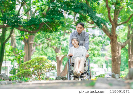 Senior woman, middle-aged man, parent and child, wheelchair Senior woman, middle-aged man, parent and child, wheelchair 119091971