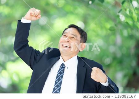 Businessman, middle-aged man, stretching Businessman, middle-aged man, stretching 119092167