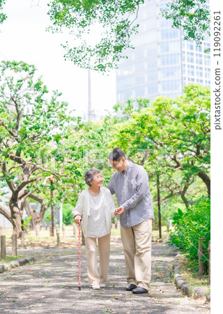 Senior woman, middle-aged man, parent and child walking 119092261