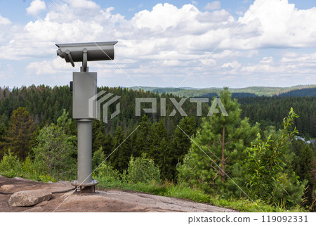 Summer mountain landscape with tourist binocular telescope Summer mountain landscape with tourist binocular telescope 119092331